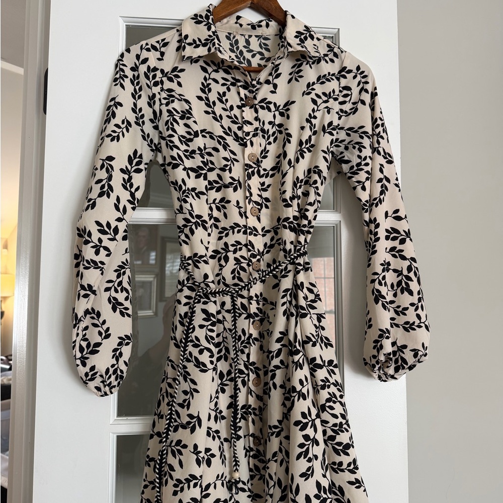 Elegant Black and Cream Floral Dress